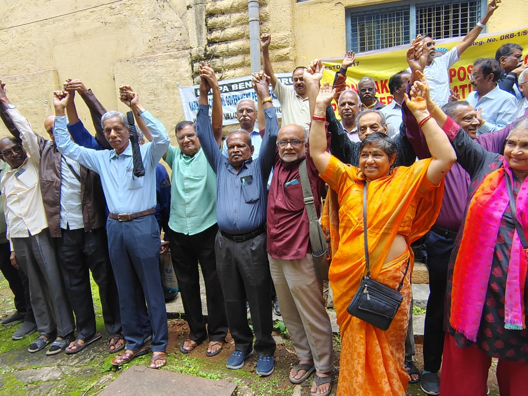 Members raising hands together at a peaceful association gathering