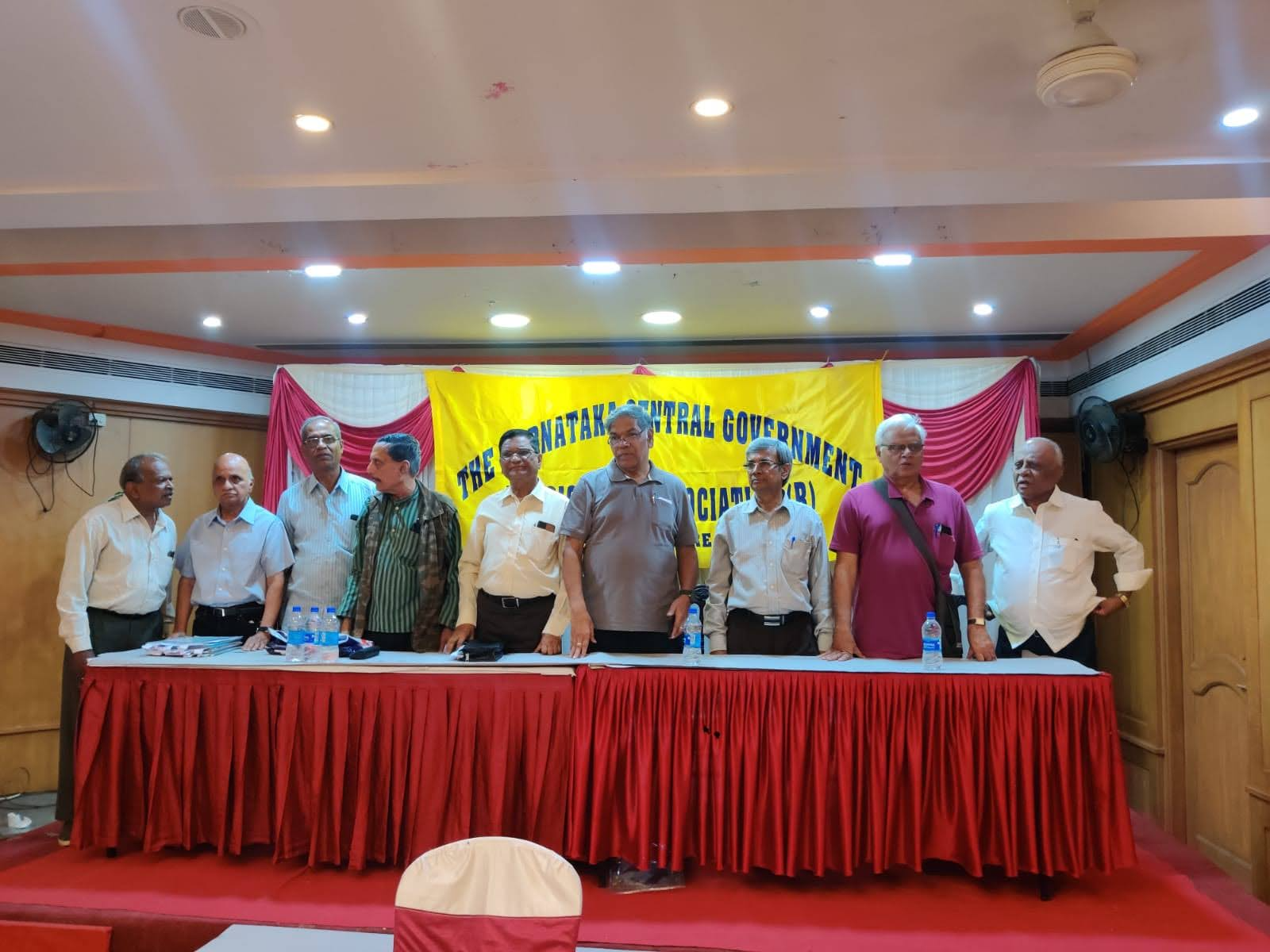 Office bearers on stage at an Association event